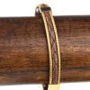 Braceet en capim dourado et cuir marron